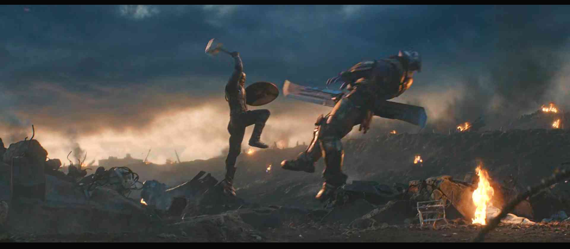 Steve-wields-thor-hammer-fighting-thanos captain-america-wields-thor-hammer-fighting-thanos-with-his-shield